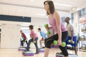 17368-men-and-women-performing-aerobic-exercises-pv