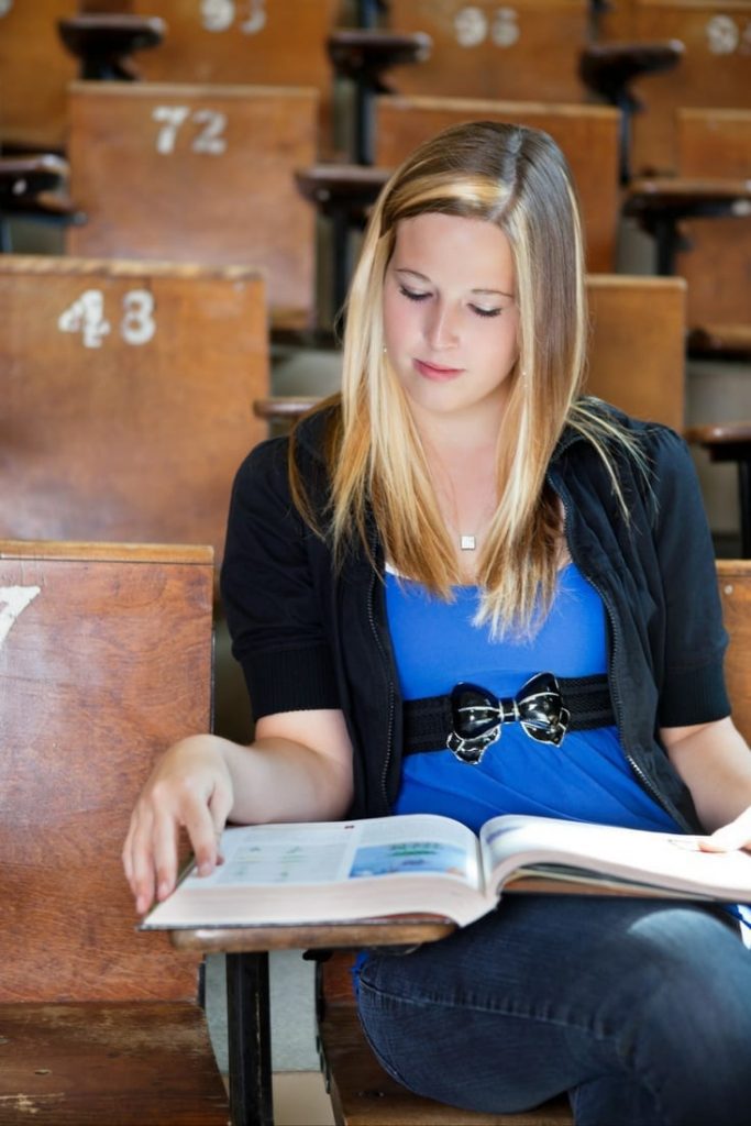 girl studying in college classroom