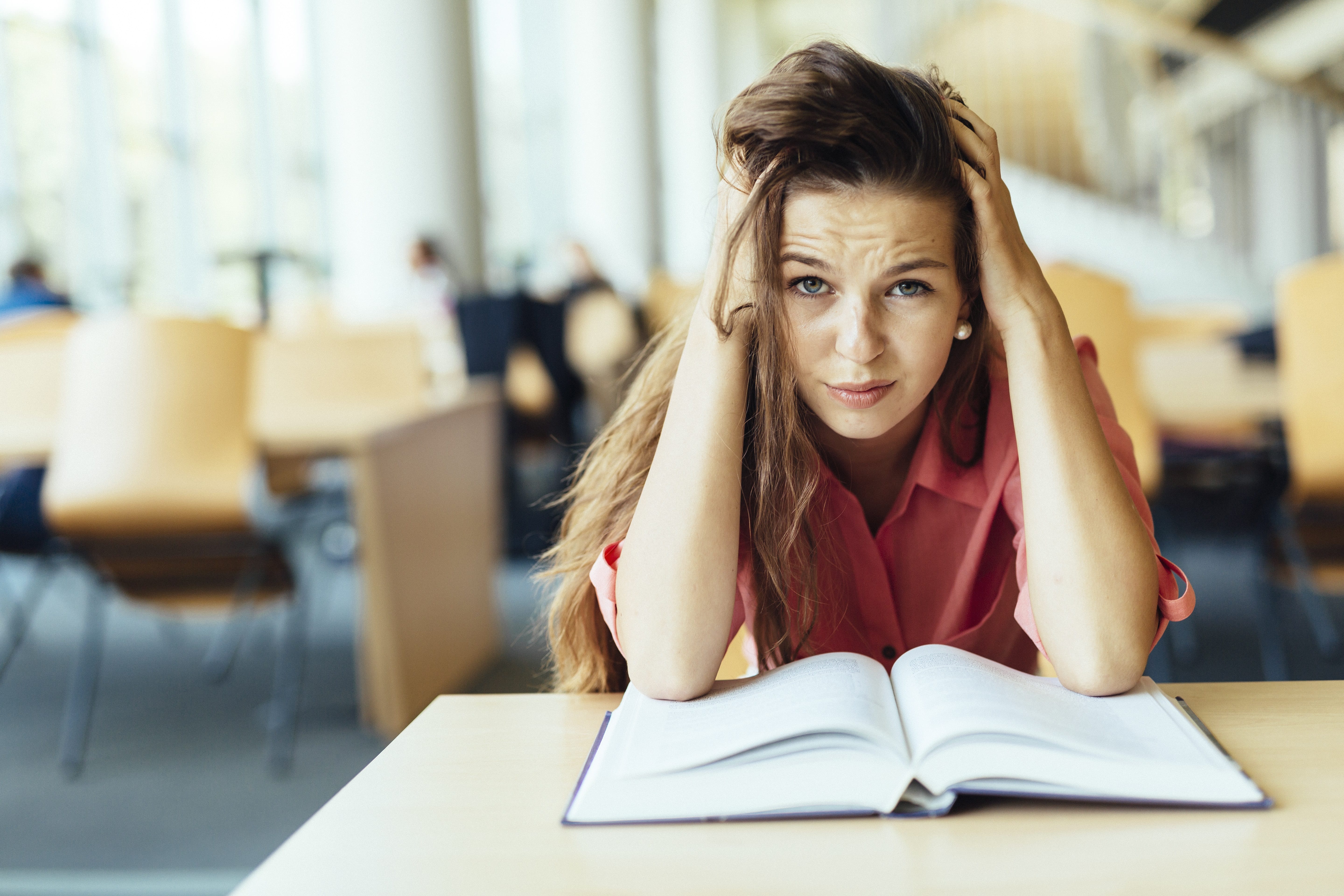 female-student-struggles-to study