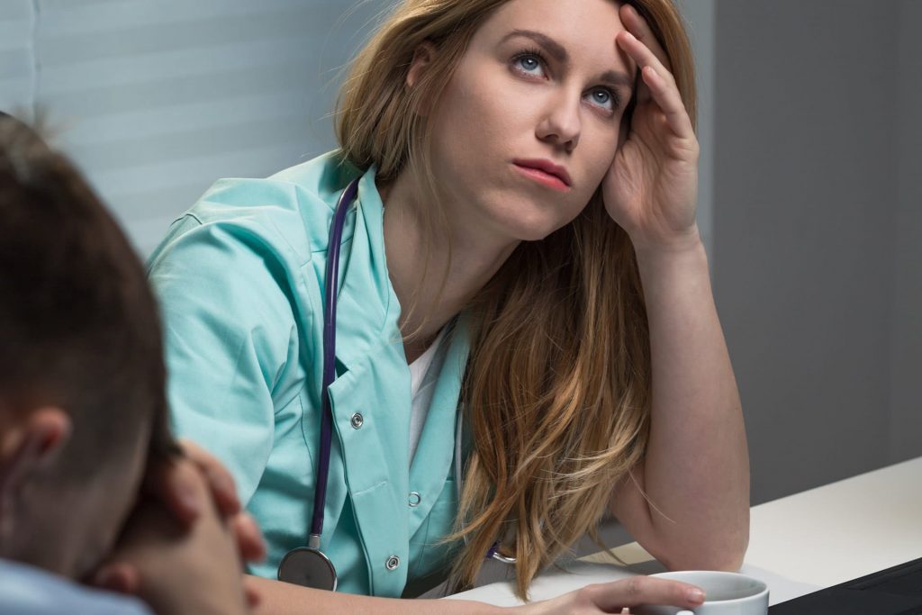 Stressed medical professional struggling with mental health