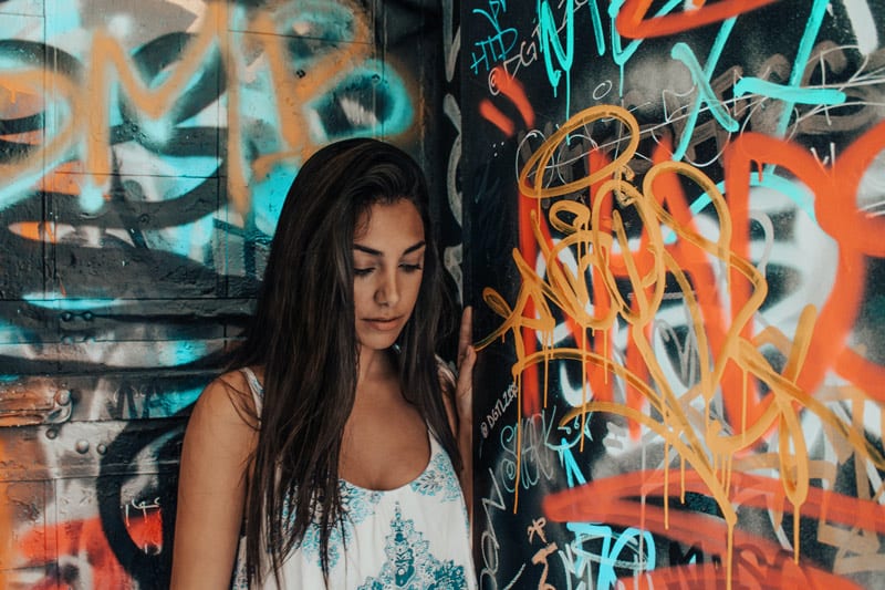 oung woman of color with graffiti