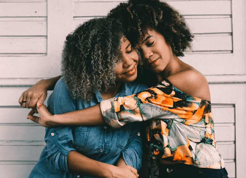 black women hugging