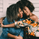 black women hugging