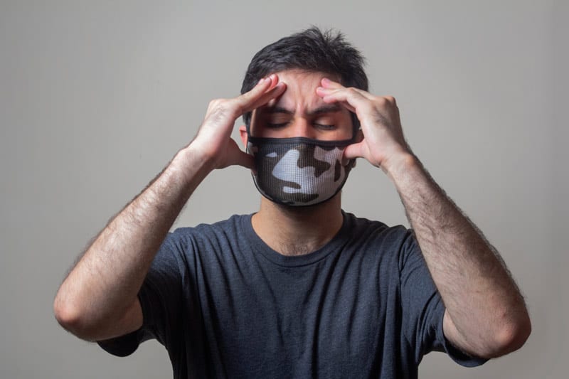 stressed man in face mask