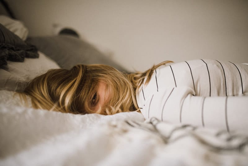 woman lying on her side