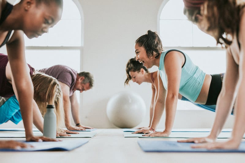 exercise class doing plank