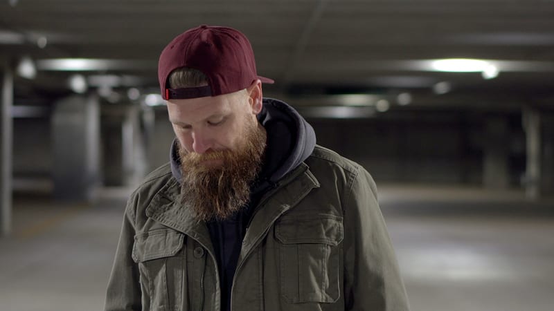 man with beard and baseball cap