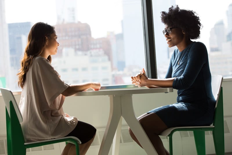 two women at a table