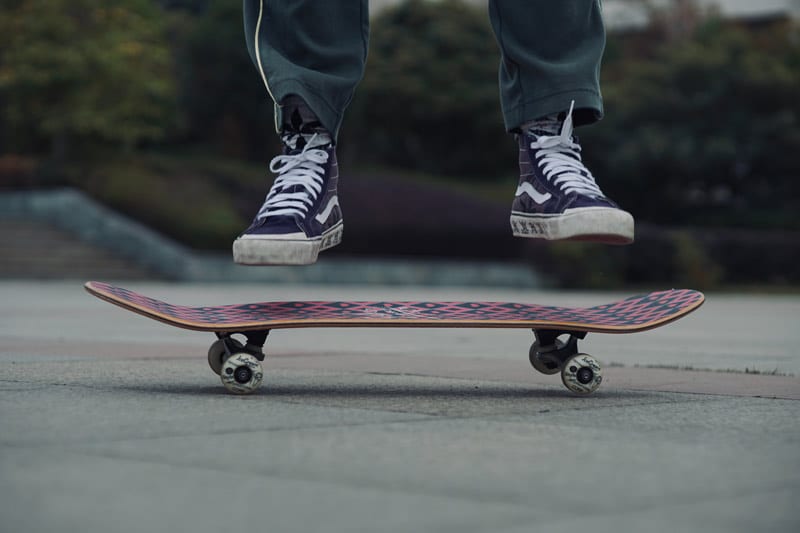close up skateboard and feet