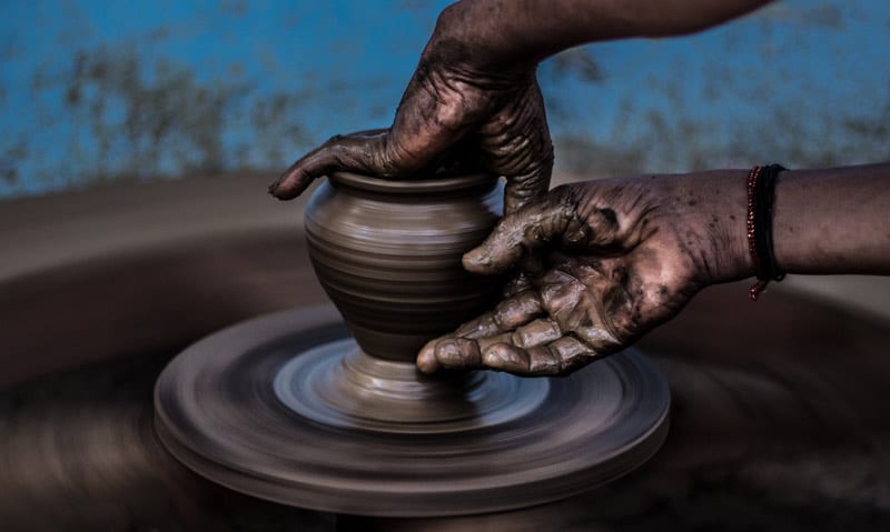 hands on pottery wheel