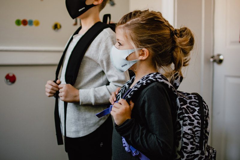 masked children at school.