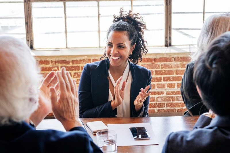diverse businesspeople clapping