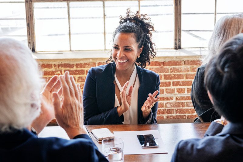 diverse businesspeople clapping