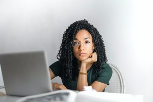 serious young woman with laptop.