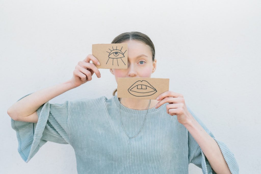 young woman with emotion signs