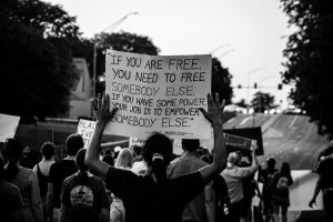 Toni Morrison quote on protest sign