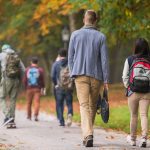 students walking on college campus