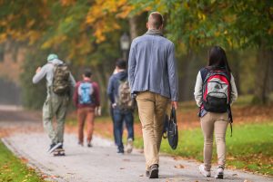 students walking on college campus