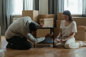 couple assembling furniture