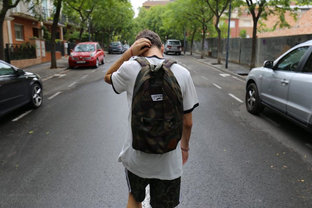 teen boy with backpack
