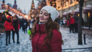 young woman in holiday street scene.