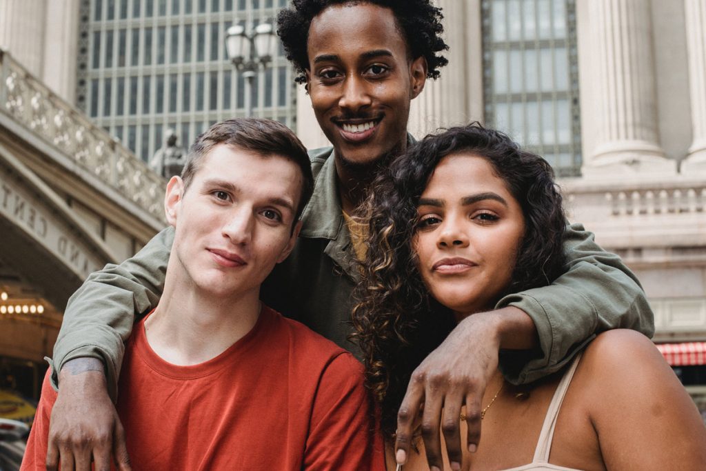 three friends smiling