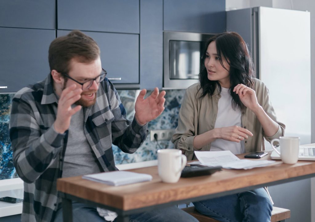 couple disagreeing over finances.