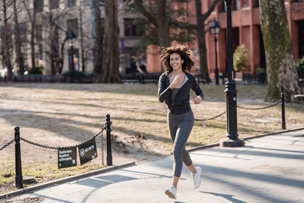 smiling woman with curly hair