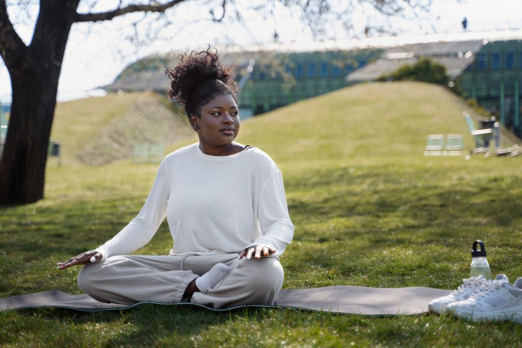 woman doing outdoors yoga