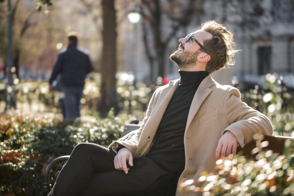 happy man on park bench