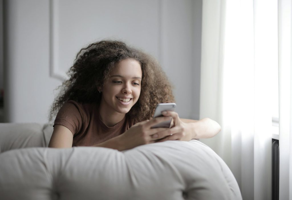 teen viewing smartphone