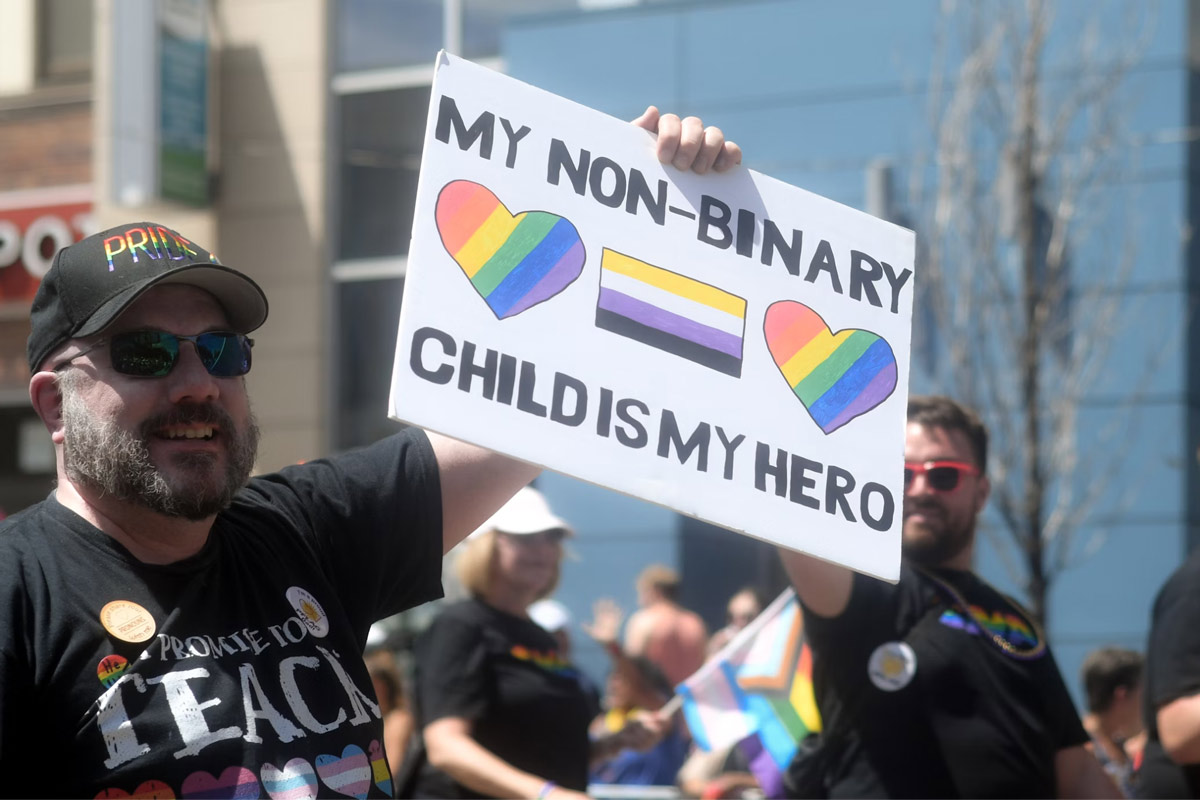 proud father with support sign