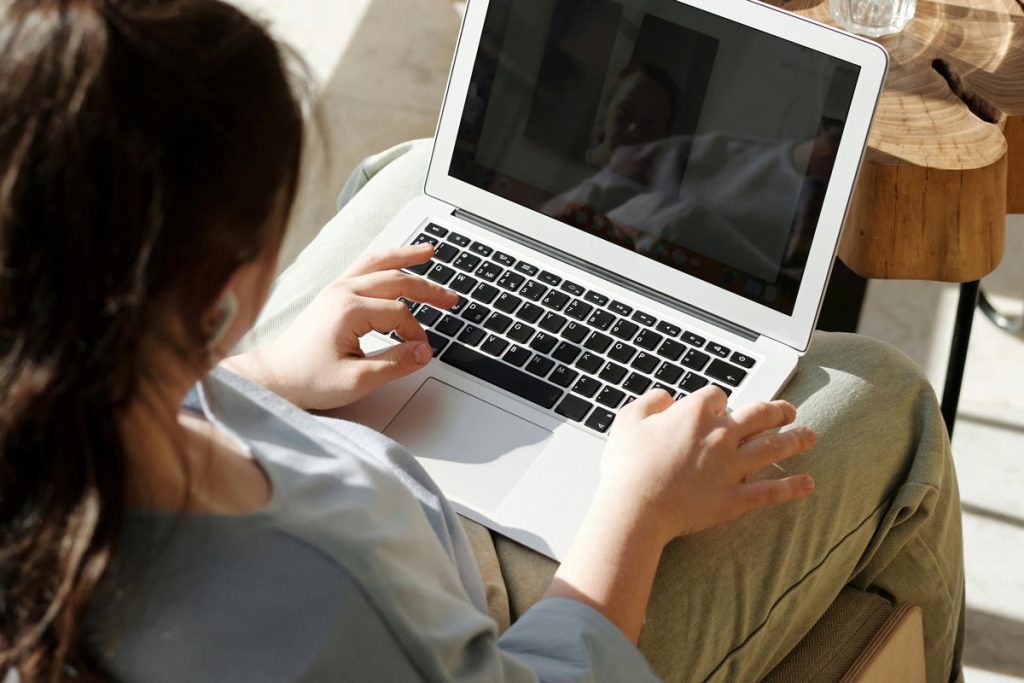 woman using laptop