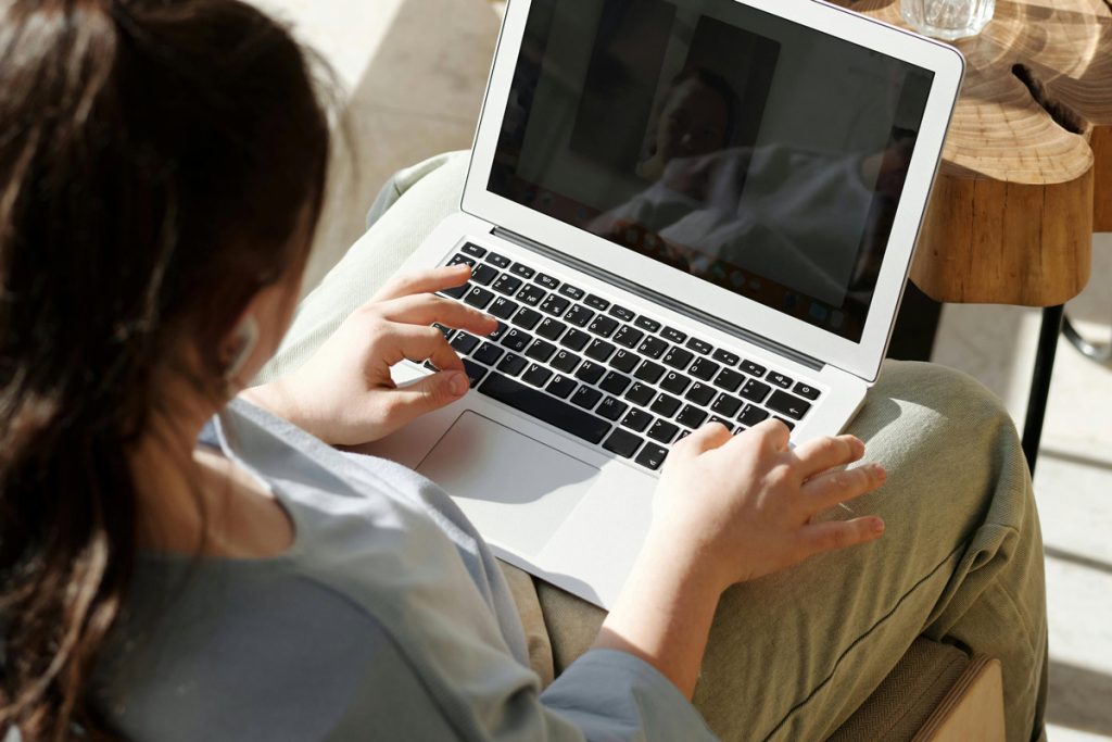 woman using laptop