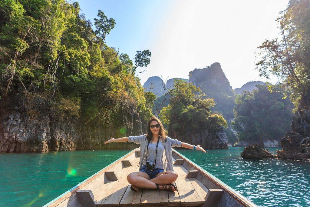 happy tourist on boat