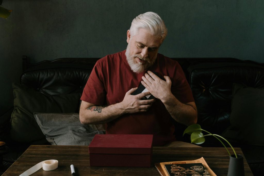 older man with gift box